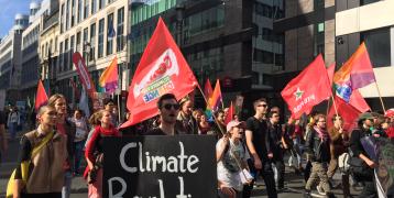 people protesting in the street 